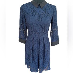 BCBGeneration navy blue lace fit and flare dress with black collar/cuffs, size 2